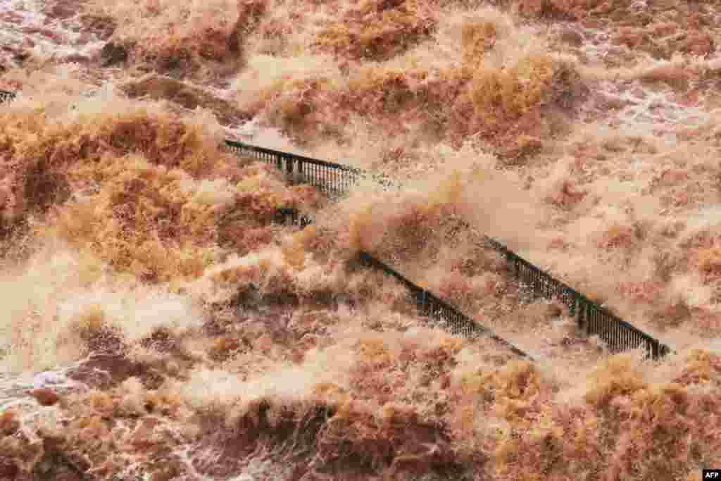 View of the visitor walkway at the Iguazu Falls, which was destroyed by the strong current of the river on the triple border between Brazil, Argentina and Paraguay, Oct. 30, 2023.