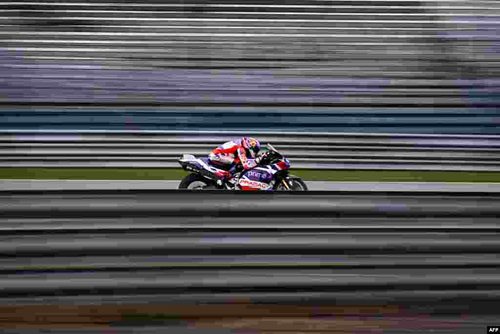 Prima Pramac Racings Spanish rider Jorge Martin rides his bike during the first free practice session of the MotoGP Thailand Grand Prix at the Buriram International Circuit in Buriram.