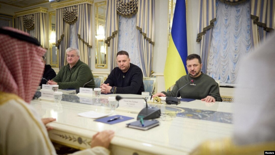 FILE - Ukraine's President Volodymyr Zelenskyy, right, attends a meeting with Foreign Minister of the Kingdom of Saudi Arabia Prince Faisal bin Farhan al-Saud in Kyiv, Feb. 26, 2023. (Ukrainian Presidential Press Service/Handout via Reuters)