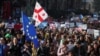 ხელისუფლება ამტკიცებს, რომ ევროკომისიის 12 რეკომენდაცია "თითქმის" შეასრულა, ოპოზიცია ამბობს, რომ ეს "ფორმალური შესრულებაა"