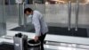 In China, Many Older Workers Find It Difficult to Retire