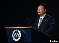 FILE - South Korean President Yoon Suk Yeol speaks during a ceremony for the 3rd Summit for Democracy in Seoul, South Korea 18 March 2024. (KIM MIN-HEE/Pool via REUTERS)