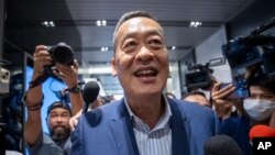 Pheu Thai's prime ministerial candidate Srettha Thavisin who is the sole candidate nominated for a parliamentary vote, speaks to media at the party headquarters in Bangkok, Thailand Tuesday, Aug. 22, 2023. (AP Photo/Wason Wanichakorn)
