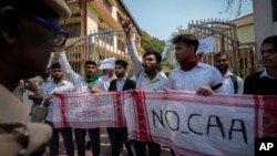 Students protest against the Citizenship Amendment Act (CAA) in Guwahati, India, Tuesday, March 12, 2024. (AP Photo/Anupam Nath)