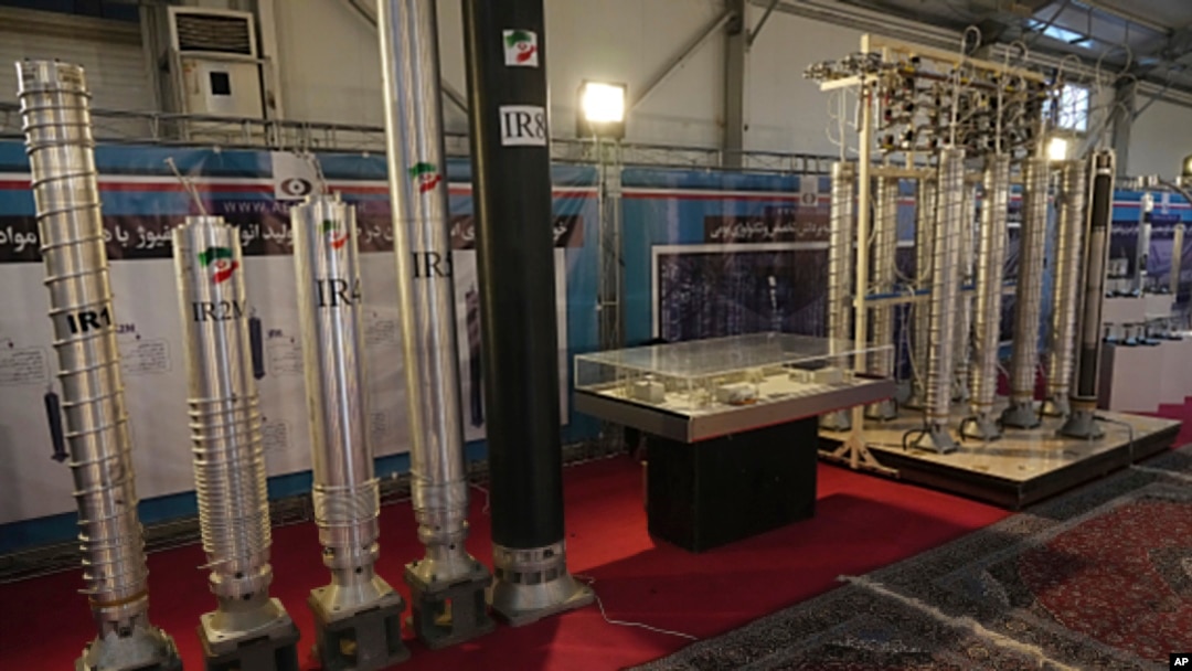 FILE - Iran's domestically built centrifuges are displayed at an exhibition of the country's nuclear achievements, in Tehran, Iran, Feb. 8, 2023. 