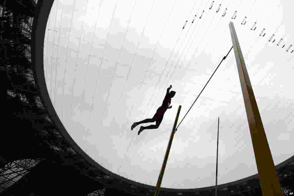 China's Sun Qihao competes during the men's decathlon pole vault 159 at the 19th Asian Games in Hangzhou, China.