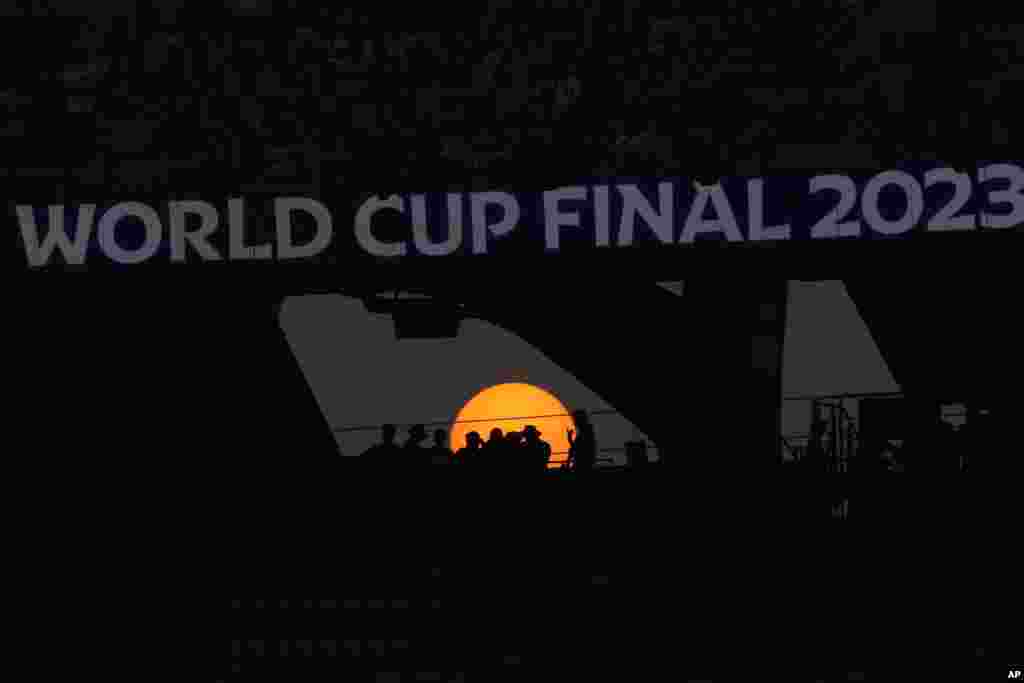 The sun sets over the Narendra Modi stadium during the ICC Men's Cricket World Cup final match between Australia and India in Ahmedabad, India.