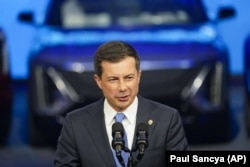 Secretary of Transportation Pete Buttigieg speaks at the North American International Auto Show, Sept. 14, 2022. (AP Photo/Paul Sancya)