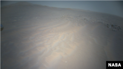 NASA’s Ingenuity Mars Helicopter captured this image in the northwest portion of a Mars region known as “Séítah” using its high-resolution color camera during its 20th flight on Feb. 25, 2022. (Image Credit: NASA/JPL-Caltech)