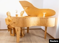Tomislav Horvat's, 34, sculpture of The Pianist made of 210,000 matches is seen in Domasinec, Croatia, January 17, 2024. (REUTERS/Antonio Bronic)