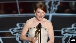 Julianne Moore accepts the award for best actress in a leading role for “Still Alice at the Oscars on Sunday, Feb. 22, 2015, at the Dolby Theatre in Los Angeles. (Photo by John Shearer/Invision/AP)