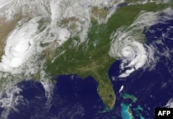 Satellite images help researchers note green spaces around schools. They also help to track storms like this one hitting the southeastern coast of the U.S. in May 2015. (AFP PHOTO)