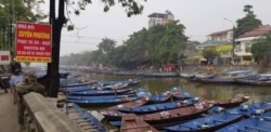 Đò bến Yến vắng bóng khách du lịch (Hình: Tạp chí Điện tử Thương Trường)
