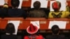 在北京人大会堂参加全国政协会议开幕式的政协委员们。（2021年3月4日）