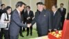 지난해 7월 한국전 정전 60주년 기념 '전승절' 행사 참석차 방북한 리위안차오 중국 국가부주석(왼쪽)이 김정은 북한 국방위원회 제1위원장과 만나 악수하고 있다.