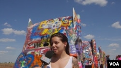Susana, a Spanish tourist at the Cadillac Ranch in Amarillo, Texas