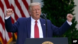 Predsednik SAD Donald Tramp govori tokom konferencije za štampu u Rouz gardenu, u Beloj kući, 14. jula 2020. u Vašingtonu (AP Photo/Evan Vucci)