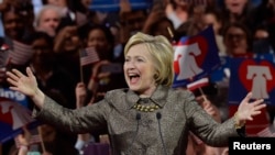 Democratic U.S. presidential candidate and former U.S. Secretary of State Hillary Clinton arrives at the podium to speak to supporters during her five state primary night rally held in Philadelphia, Pennsylvania, April 26, 2016.