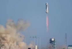 Blue Origin's New Shepard rocket launches carrying passengers William Shatner, Chris Boshuizen, Audrey Powers and Glen de Vries from its spaceport near Van Horn, Texas, Wednesday, Oct. 13, 2021. (AP Photo/LM Otero)