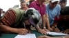 La oposición en Venezuela recolectó casi dos millones de firmas para activar el referendo revocatorio contra el presidente Nicolás Maduro.