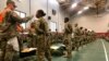 Thousands Delay Plans to Leave US Military