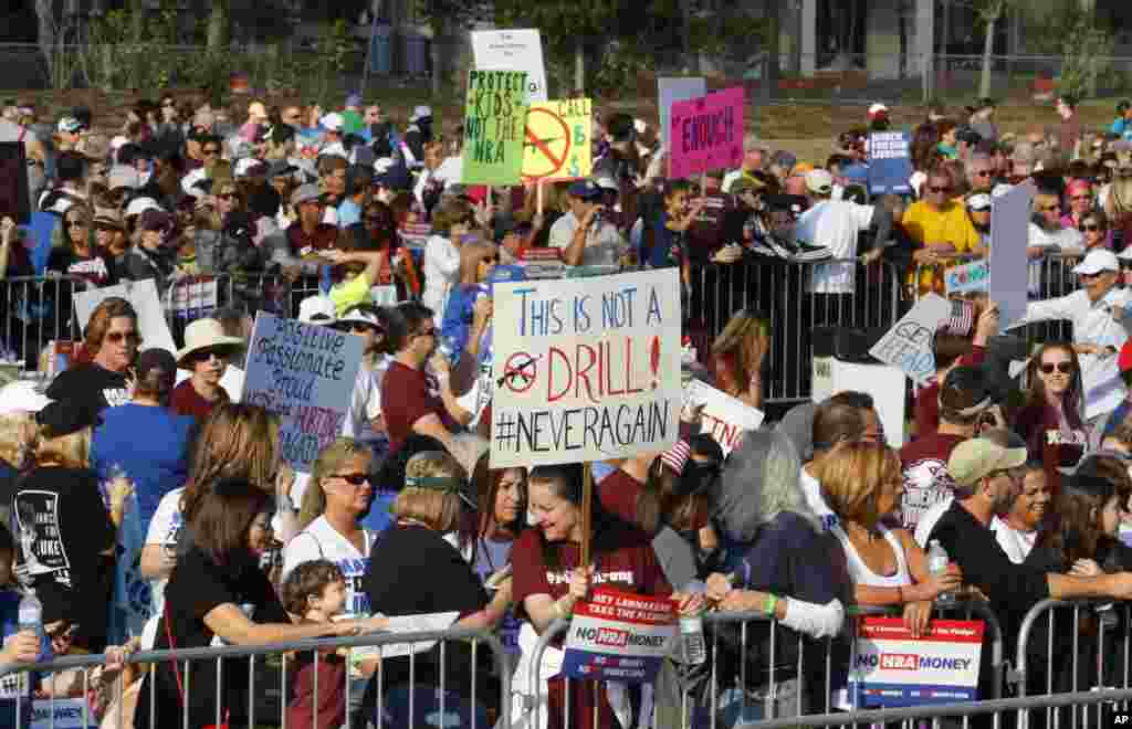 Participants gather during the "March For Our Lives-Parkland" event, in Parkland, Fla. (AP Photo/Joe Skipper)