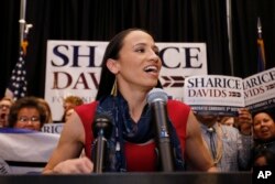 Democrat Sharice Davids speaks to supporters at a victory party in Olathe, Kan., Tuesday, Nov. 6, 2018. (AP Photo/Colin E. Braley)