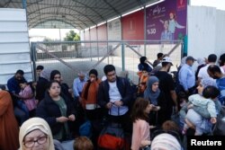 دوتابعیتی‌ها در گذرگاه رفح در مرز غزه و مصر