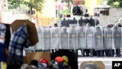 Anti-government demonstrators face off with Venezuelan Bolivarian National Guard officers on the first day of a 48-hour general strike in protest of government plans to rewrite the constitution, in the Bello Campo neighborhood of Caracas, Venezuela, July 26, 2017.