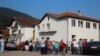 Bosnia and Herzegovina -- Children and parents from Konjevic Polje in front of the Educational center in Nova Kasaba, August 31, 2021.