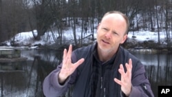 Norwegian comedian Harald Ela explains why Norwegians are the happiest people on earth during an interview in Oslo, Norway on Monday March 20, 2017. (AP Photo/David Keyton)