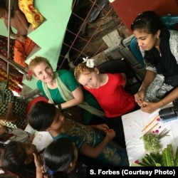 Sasha Forbes and her 9-year-old daughter Maya visit a new village being served by the Girls Education Program in Khulna, Bangladesh, April, 2018.