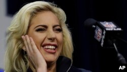 Lady Gaga answers questions at a news conference in Houston ahead of NFL Super Bowl LI, Feb. 2, 2017.