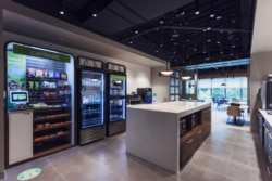 New touchless payment terminals for snack and vending machines are seen at Canteen's headquarters in Charlotte, North Carolina, U.S. in this undated handout image. Canteen is a division of Compass Group. (Canteen/Handout via Reuters)