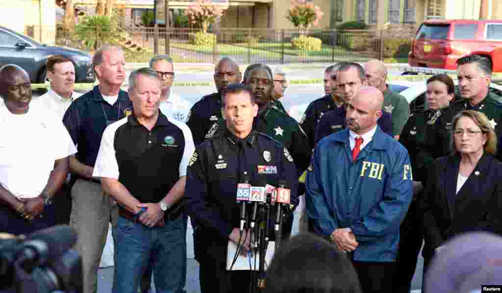 Orlando Police Chief John Mina and other city officials answer the media's questions about the Pulse nightclub shooting in Orlando, Florida, June 12, 2016.