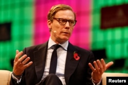 CEO of Cambridge Analytica, Alexander Nix, speaks during the Web Summit, Europe's biggest tech conference, in Lisbon, Portugal, November 9, 2017. REUTERS/Pedro Nunes