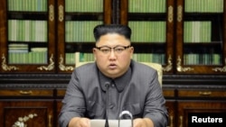 North Korea's leader Kim Jong Un makes a statement regarding U.S. President Donald Trump's speech at the U.N. general assembly, in this undated photo released by North Korea's Korean Central News Agency in Pyongyang, Sept. 22, 2017.
