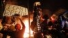 White US Policeman Charged with Murder in Black Man's Death