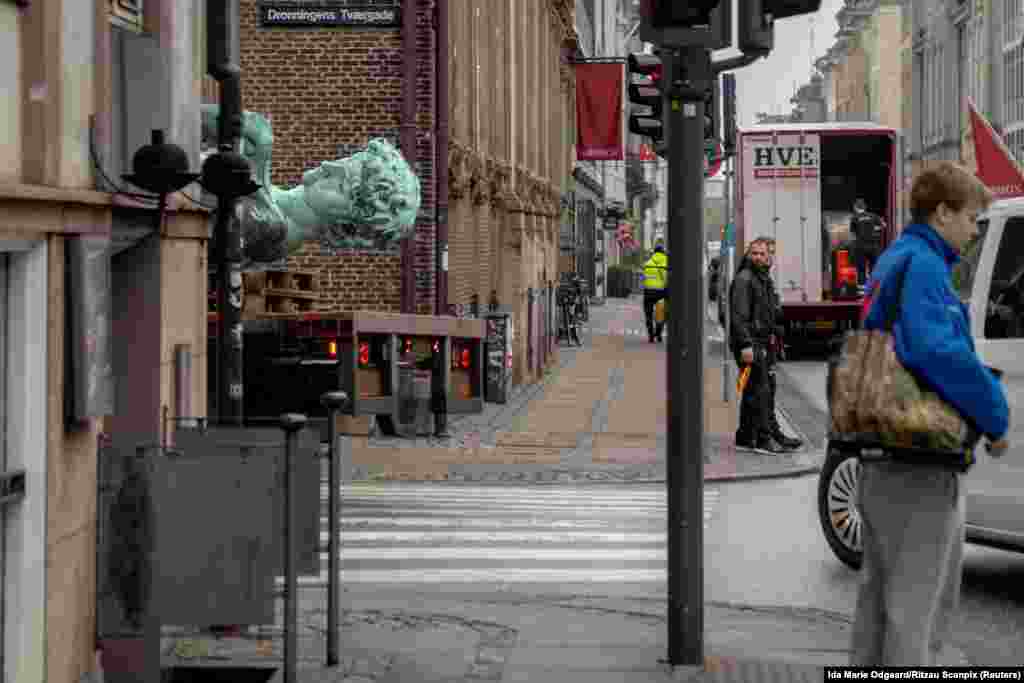 A replica of Michelangelo's statue of David is being transported from Copenhagen's waterfront to the National Gallery of Denmark, in Copenhagen, Denmark.