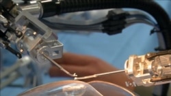 Robotic Device Small Enough to Operate on the Human Eye
