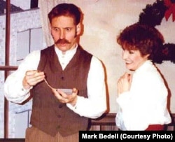 Jim looks at the chain Della gave him. From a production of The Gift of the Magi, dramatized by Mark Bedell. (Courtesy of Mark Bedell)