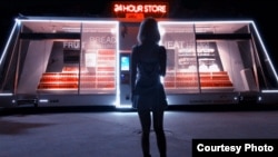 The Moby Mart movable vehicle is being tested in Shanghai, China. It allows users to request the robot through an app, then step inside to buy desired items. (Himalafy/Wheelys)