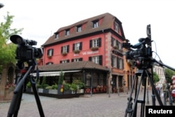 Media cameras are seen outside Le Chambard Hotel in Kaysersberg-Vignoble, where Bourdain was found dead on France, June 8, 2018.