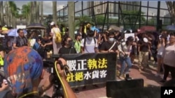 香港上水和沙田区星期六（2019年7月13日）爆发反“水货客”抗议。图片来源：美联社