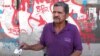 Carlos, un vigilante de 56 años, dice se vio obligado, por la crisis en la nación a censarse con el carnet de la patria.