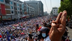 People protest against the military coup in Mandalay, Myanmar February 22, 2021. Picture taken February 22, 2021.