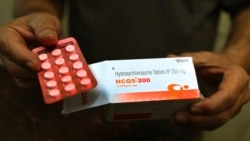 In this Thursday, April 9, 2020 file photo, a chemist displays hydroxychloroquine tablets in New Delhi, India. Chloroquine and the related drug hydroxychloroquine have been pushed by President Donald Trump after some early tests suggested the drugs might