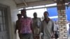 Tiwonge Chimbalanga and Steven Monjeza are taken into custody after celebrating their engagement (photo by Lameck Masina)