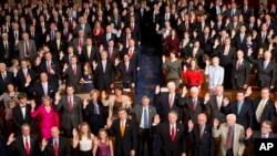 Members of the 113th Congress take the oath of office.