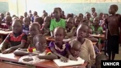 Young refugees from South Sudan listen to teacher Koat Reath in the classroom where he teaches at the Jewi refugee camp in Gambella, Ethiopia. (Photo: UNHCR)